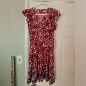 Selling because it's a little too sort for my height but really cute on.